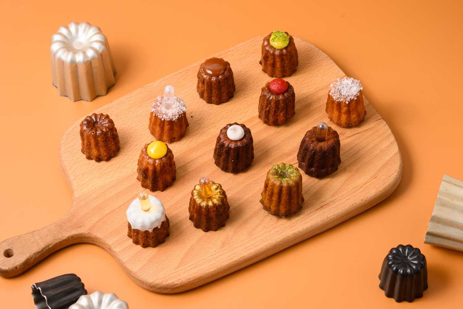 Mix of mini Cannelé freshly baked